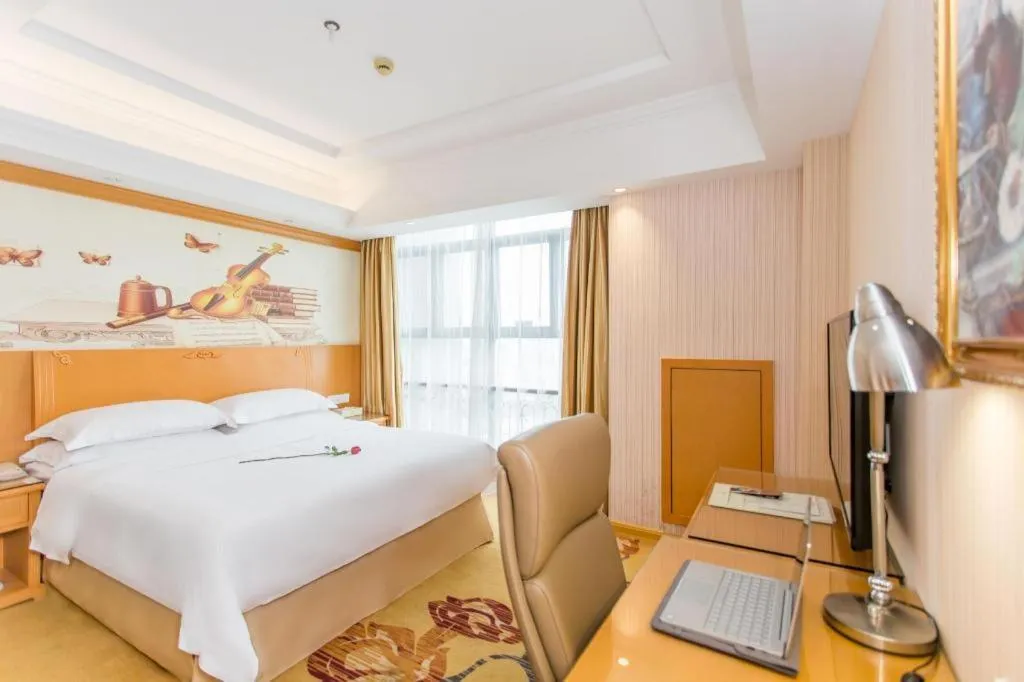 Bed in Vienna Hotel Jiangsu Kunshan Changjiang North Road Fenghuangcheng