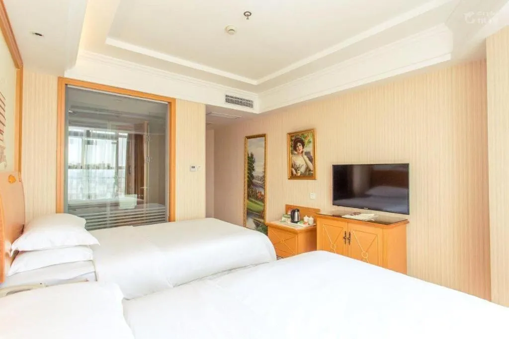 Bed in Vienna Hotel Jiangsu Kunshan Changjiang North Road Fenghuangcheng