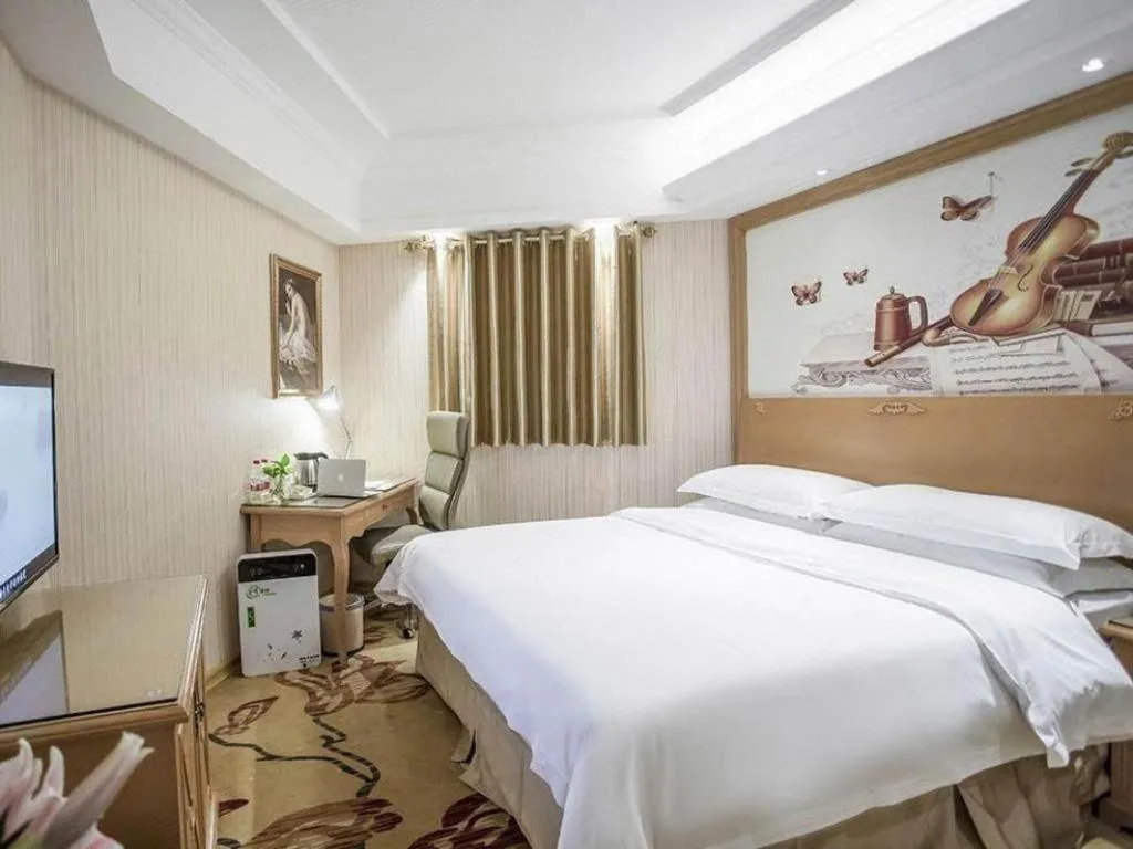 Bed in Vienna Hotel Jiangsu Kunshan Changjiang North Road Fenghuangcheng