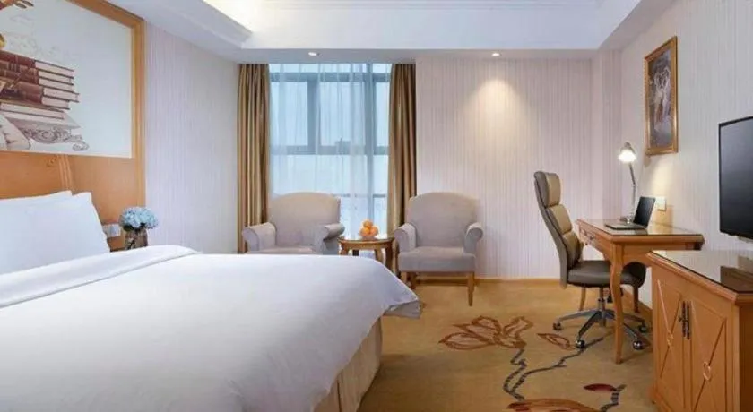 Bed in Vienna Hotel Jiangsu Kunshan Changjiang North Road Fenghuangcheng