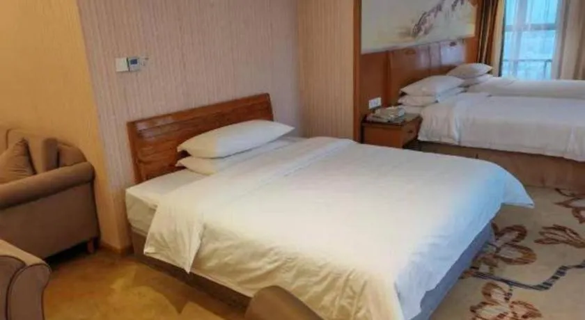 Bed in Vienna Hotel Jiangsu Kunshan Changjiang North Road Fenghuangcheng