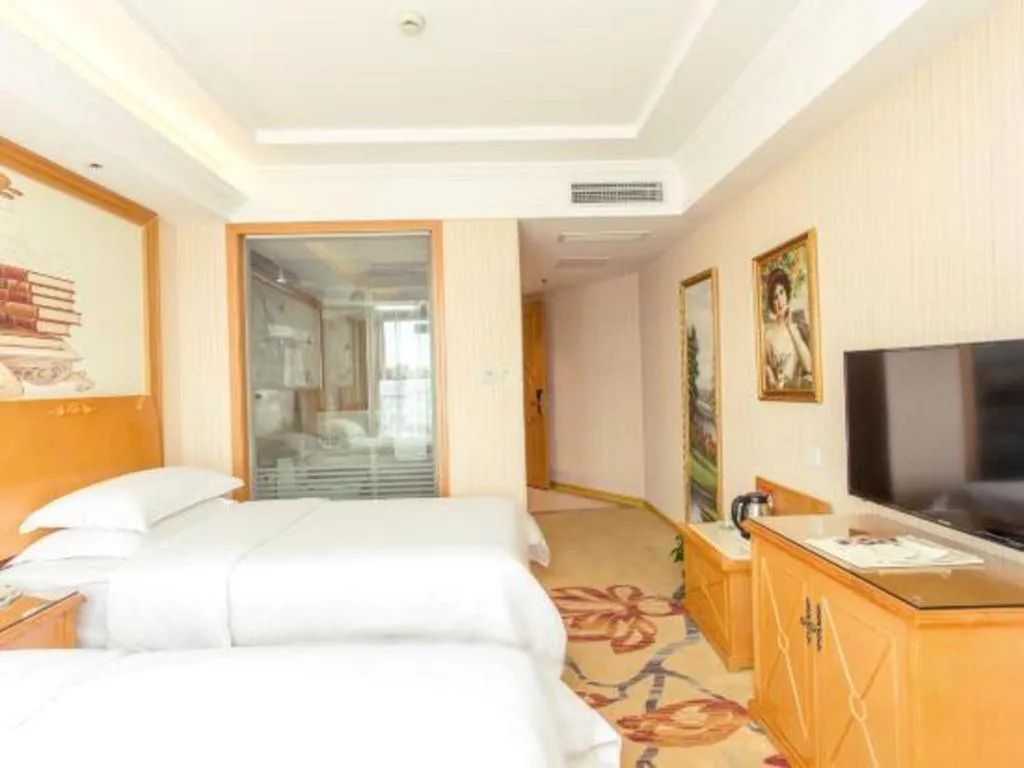 Bed in Vienna Hotel Jiangsu Kunshan Changjiang North Road Fenghuangcheng