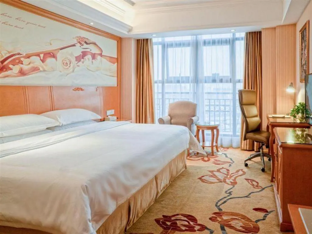 Bed in Vienna Hotel Jiangsu Kunshan Changjiang North Road Fenghuangcheng