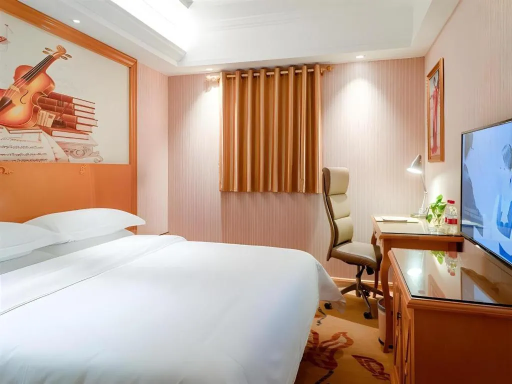 Bed in Vienna Hotel Jiangsu Kunshan Changjiang North Road Fenghuangcheng