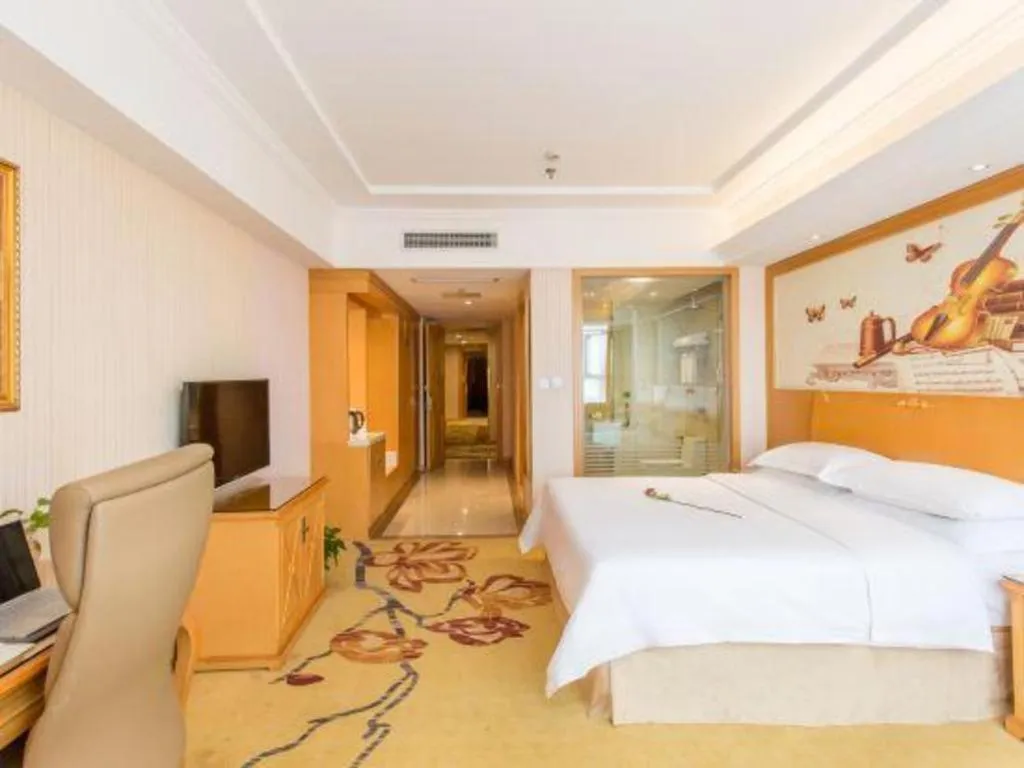 Bed in Vienna Hotel Jiangsu Kunshan Changjiang North Road Fenghuangcheng