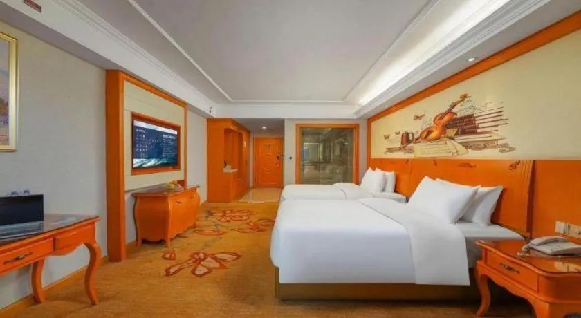 Bed in Vienna Hotel Guiyang North Station Dream City