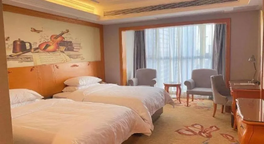 Bed in Vienna Hotel Guiyang North Station Dream City