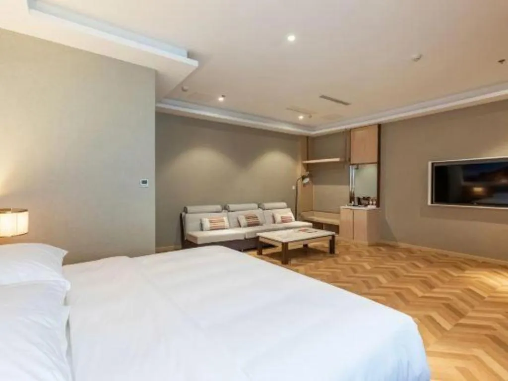 Bed in Vienna Hotel Jiangsu Dongtai Wanghai West Road