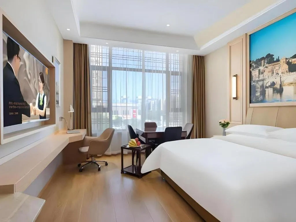 Bed in Vienna Hotel Jiangsu Dongtai Wanghai West Road
