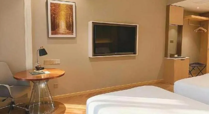 Bed in Vienna Hotel Jiangsu Dongtai Wanghai West Road