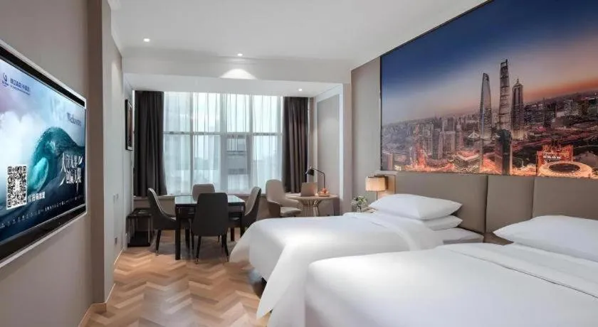 Bed in Vienna Hotel Jiangsu Dongtai Wanghai West Road