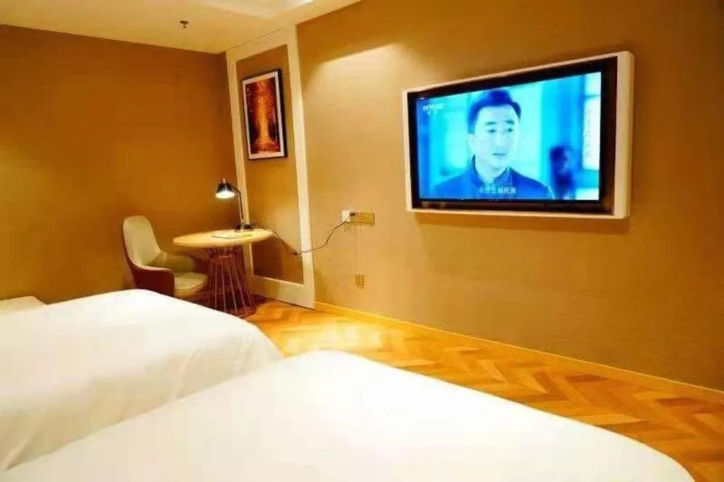 Bed in Vienna Hotel Jiangsu Dongtai Wanghai West Road
