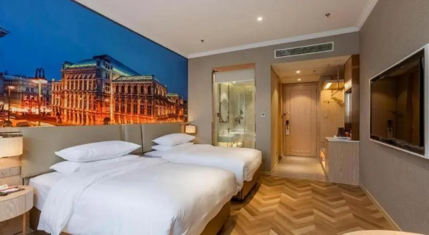 Bed in Vienna Hotel Jiangsu Dongtai Wanghai West Road