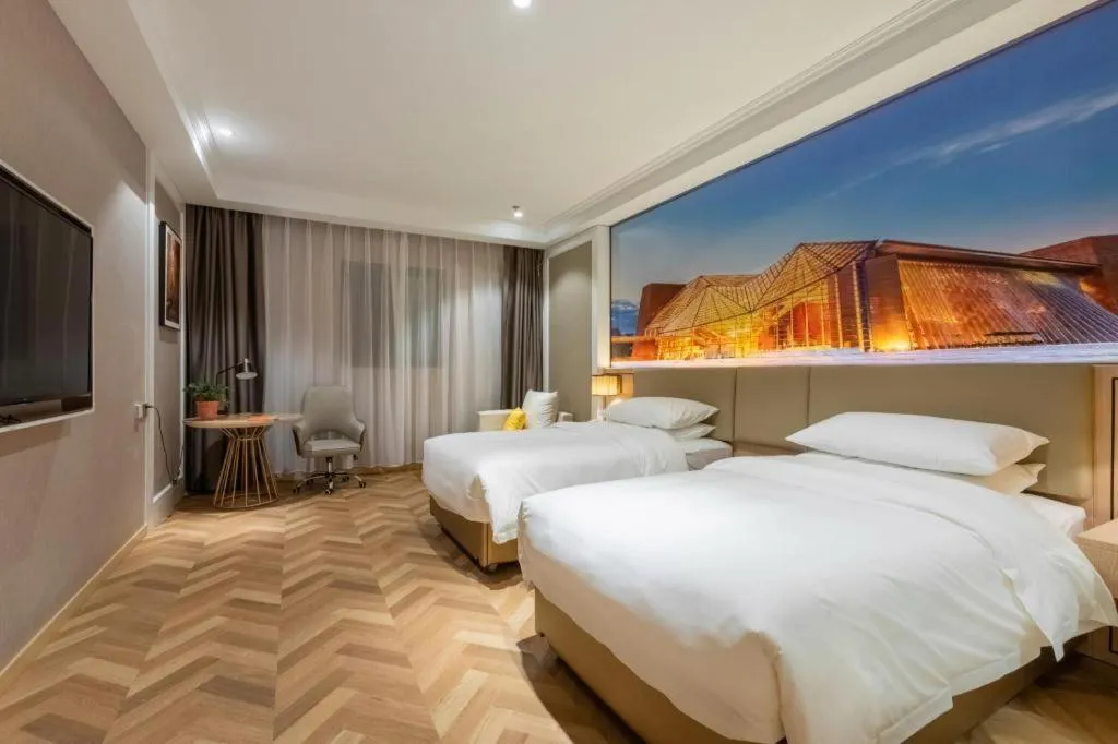 Bed in Vienna Hotel Jiangsu Dongtai Wanghai West Road