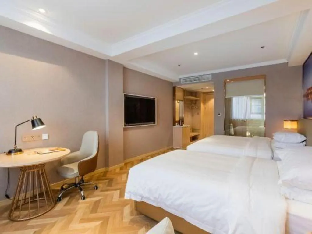 Bed in Vienna Hotel Jiangsu Dongtai Wanghai West Road