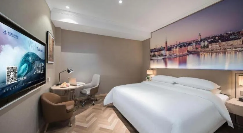 Bed in Vienna Hotel Jiangsu Dongtai Wanghai West Road