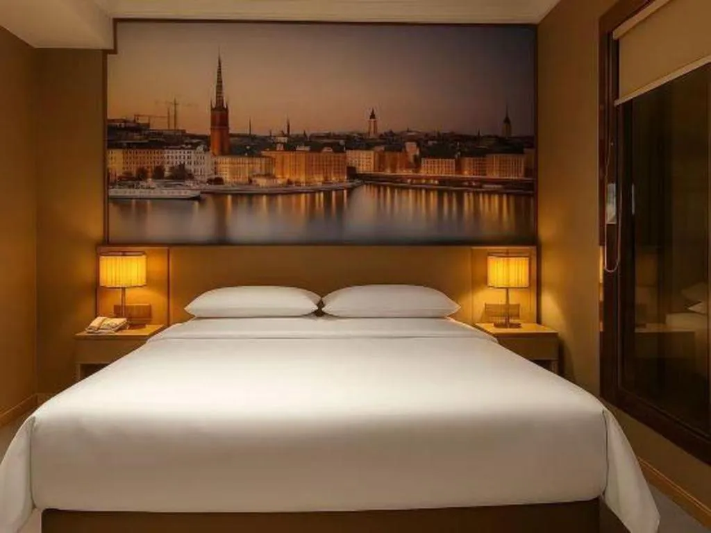 Bed in Vienna Hotel Jiangsu Dongtai Wanghai West Road