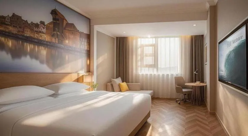 Bed in Vienna Hotel Jiangsu Dongtai Wanghai West Road