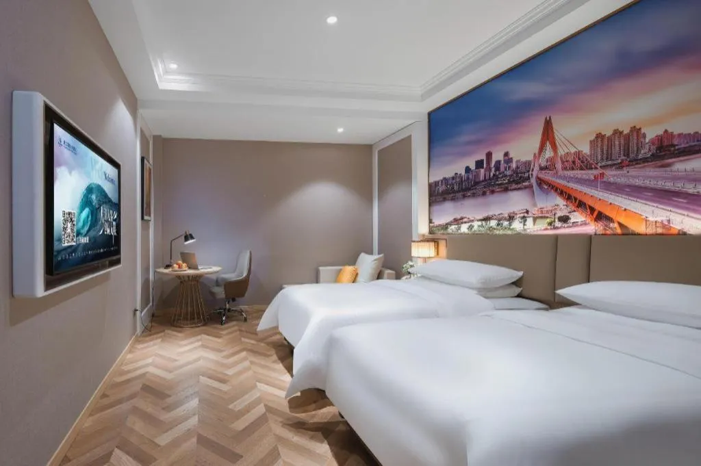 Bed in Vienna Hotel Jiangsu Dongtai Wanghai West Road