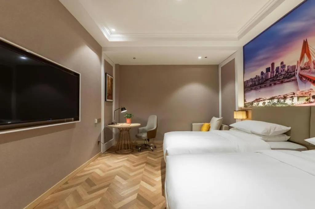 Bed in Vienna Hotel Jiangsu Dongtai Wanghai West Road