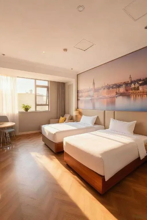 Bed in Vienna Hotel Jiangsu Dongtai Wanghai West Road