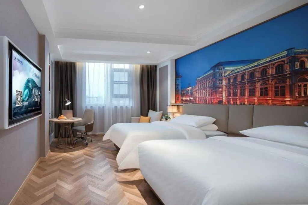 Bed in Vienna Hotel Jiangsu Dongtai Wanghai West Road