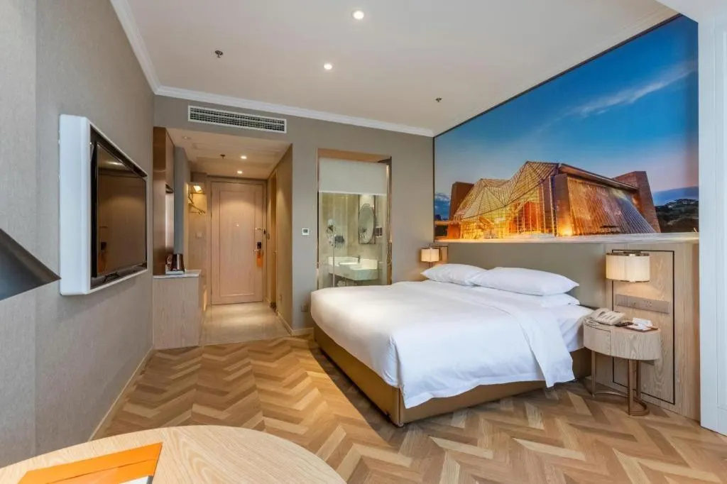 Bed in Vienna Hotel Jiangsu Dongtai Wanghai West Road