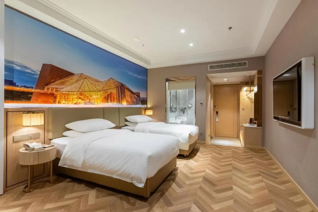 Bed in Vienna Hotel Jiangsu Dongtai Wanghai West Road