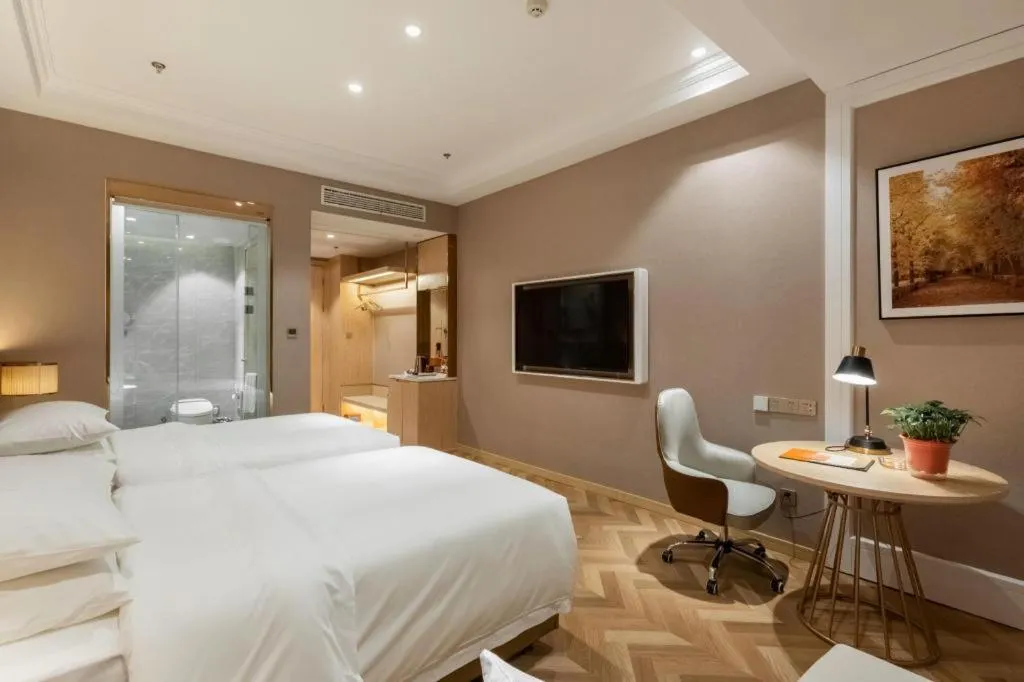 Bed in Vienna Hotel Jiangsu Dongtai Wanghai West Road