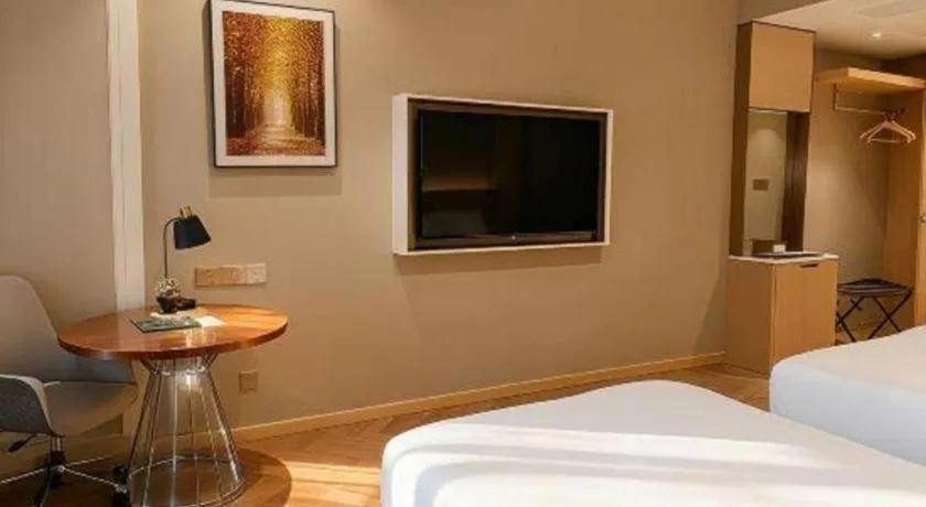 Bed in Vienna Hotel Jiangsu Dongtai Wanghai West Road