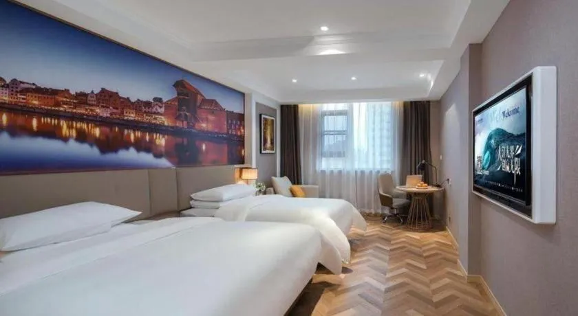 Bed in Vienna Hotel Jiangsu Dongtai Wanghai West Road