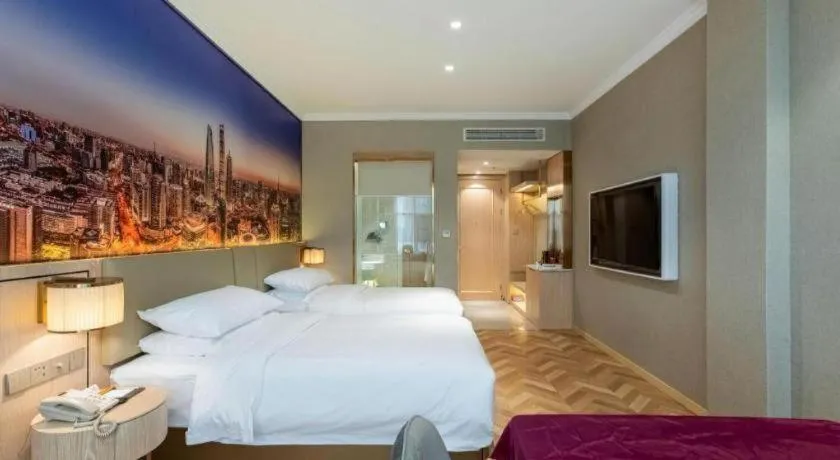 Bed in Vienna Hotel Jiangsu Dongtai Wanghai West Road