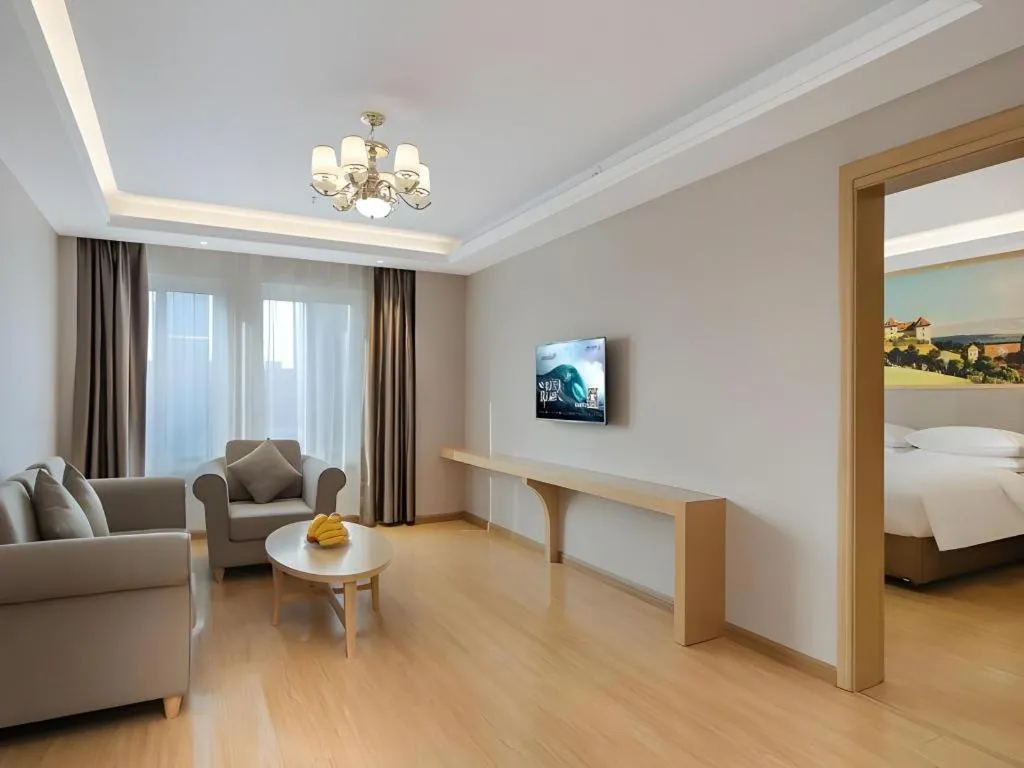 Bed in Vienna Hotel Jiangsu Dongtai Wanghai West Road