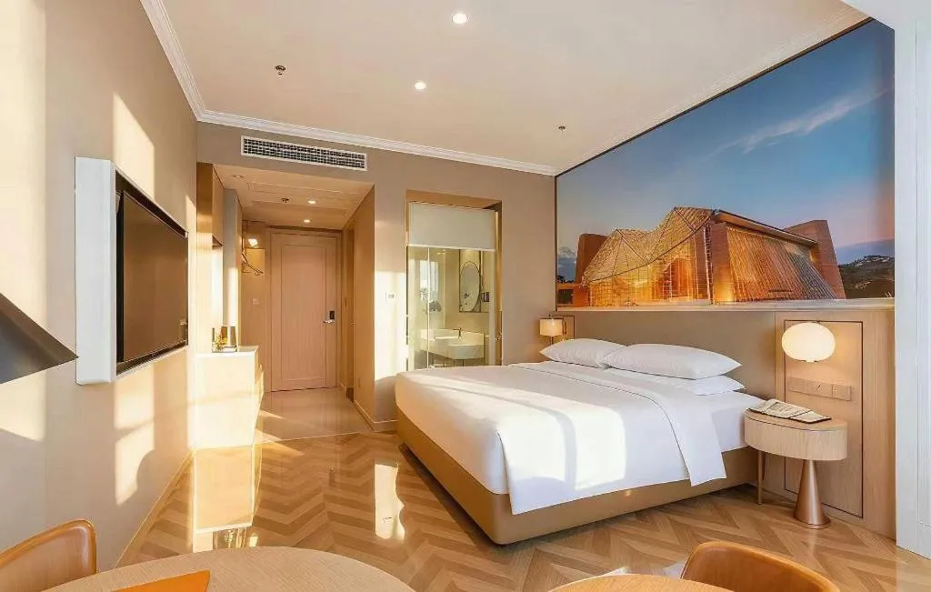 Bed in Vienna Hotel Jiangsu Dongtai Wanghai West Road
