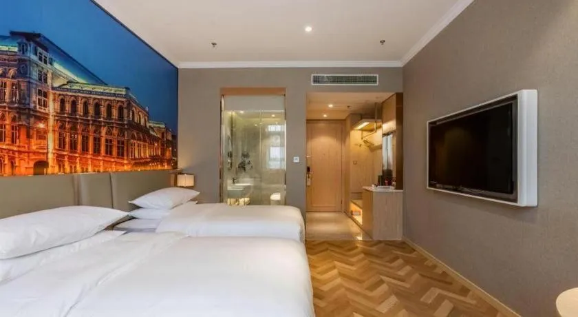 Bed in Vienna Hotel Jiangsu Dongtai Wanghai West Road