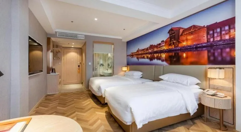Bed in Vienna Hotel Jiangsu Dongtai Wanghai West Road