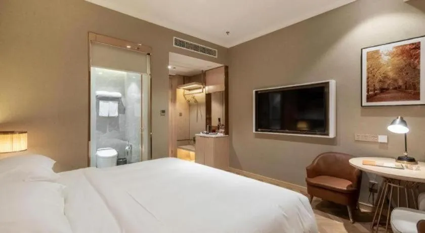 Bed in Vienna Hotel Jiangsu Dongtai Wanghai West Road