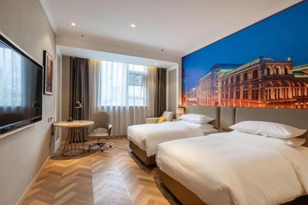 Bed in Vienna Hotel Jiangsu Dongtai Wanghai West Road