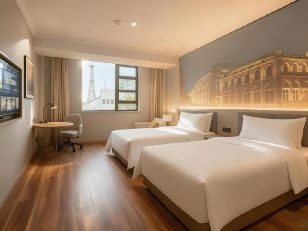 Bed in Vienna Hotel Jiangsu Dongtai Wanghai West Road
