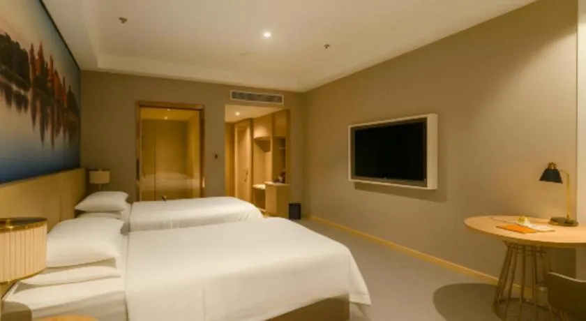 Bed in Vienna Hotel Jiangsu Dongtai Wanghai West Road