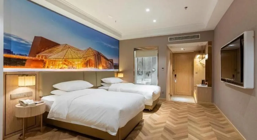 Bed in Vienna Hotel Jiangsu Dongtai Wanghai West Road