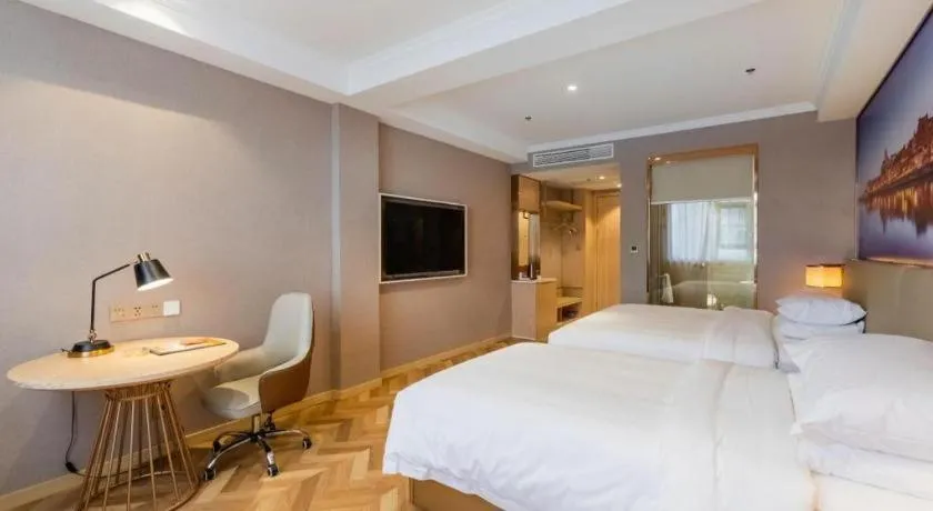 Bed in Vienna Hotel Jiangsu Dongtai Wanghai West Road