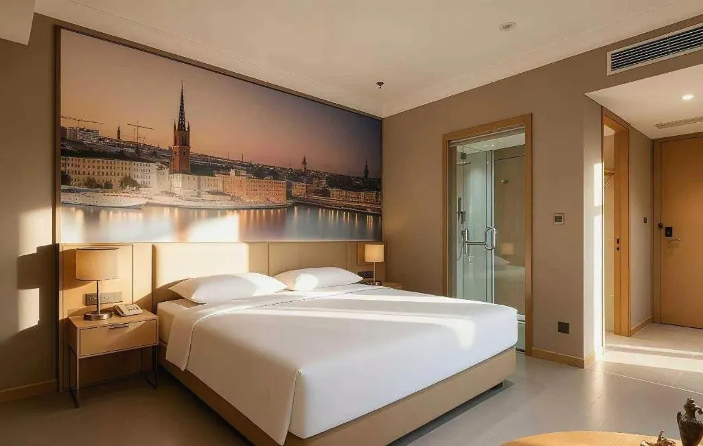 Bed in Vienna Hotel Jiangsu Dongtai Wanghai West Road