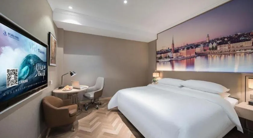 Bed in Vienna Hotel Jiangsu Dongtai Wanghai West Road