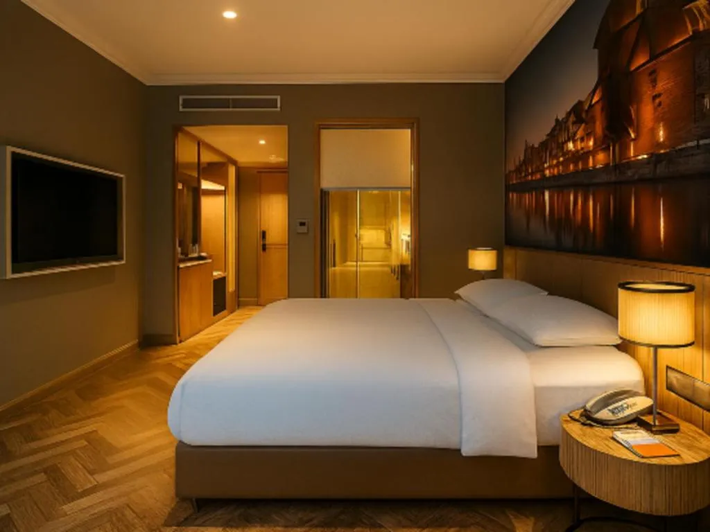 Bed in Vienna Hotel Jiangsu Dongtai Wanghai West Road