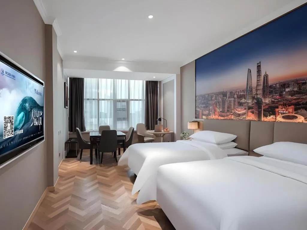 Bed in Vienna Hotel Jiangsu Dongtai Wanghai West Road