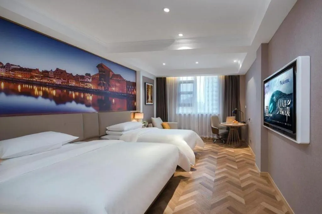 Bed in Vienna Hotel Jiangsu Dongtai Wanghai West Road