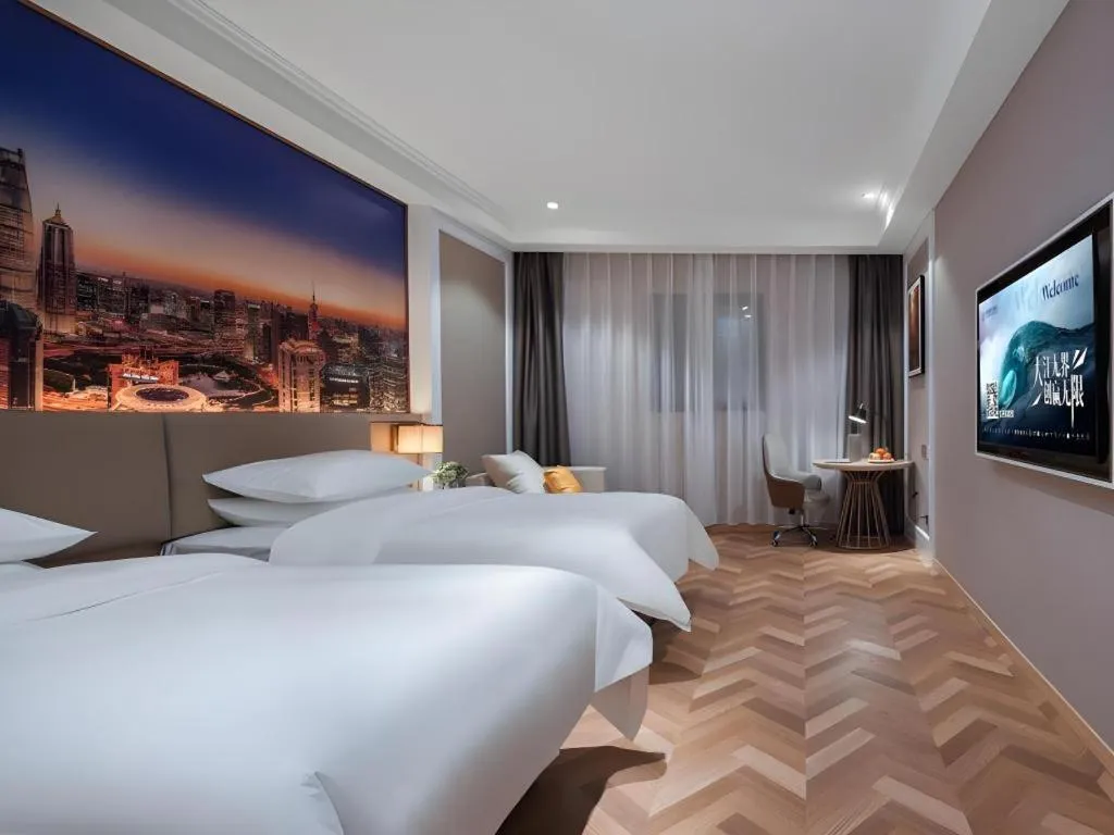 Bed in Vienna Hotel Jiangsu Dongtai Wanghai West Road