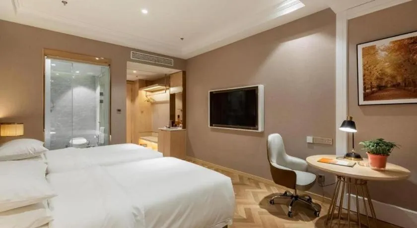 Bed in Vienna Hotel Jiangsu Dongtai Wanghai West Road