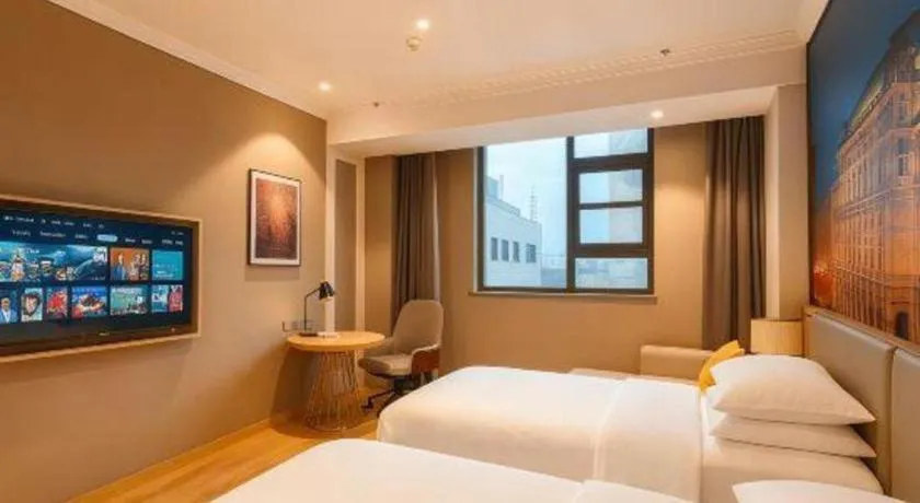 Bed in Vienna Hotel Jiangsu Dongtai Wanghai West Road